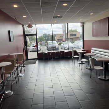 Gong Cha - the inside of a restaurant with tables and chairs - Bubble Tea Near Me - Edison, New Jersey