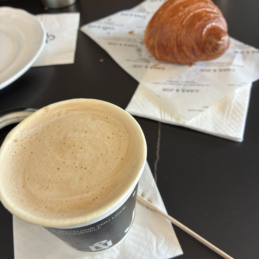 Caramel macchiato and plain croissant Caramel macchiato and plain croissant