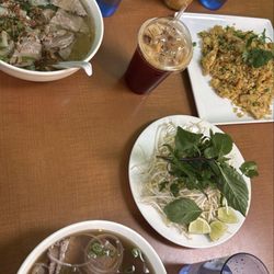 Pho Sai Gon - Brisket pho, beef udon, chicken fried rice, matcha milk tea, strawberry tea, and milk tea.