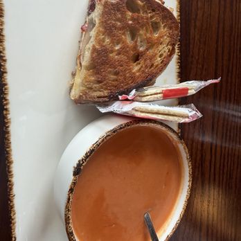 After 26 Depot Cafe - 1/2 Adult Grilled Cheese Sandwich and a cup of Tomato Bisque soup - American Near Me - Cadillac, Michigan