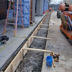 Rmk concrete services  - 200ft of curb