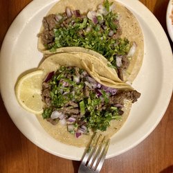Adelita's Restaurant - Carne asada tacos-onion and cilantro. Lemon included for my tacos!