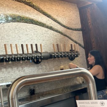 Lucette Brewing - Jacky doing excellent pours. - Pizza Near Me - Menomonie, Wisconsin