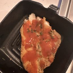 Catfish that has ZERO seasoning. Just super fishy and nasty. Catfish that has ZERO seasoning. Just super fishy and nasty.