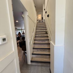 Up the stairs to the quiet dining area Up the stairs to the quiet dining area