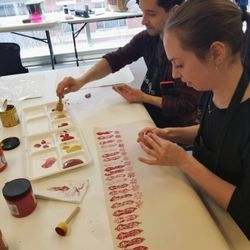 Trisha Gupta Studio: Art and Textile classes - This is another example of wrapping paper. Students are printing their hand carved woodblocks prior to printing on fabric.