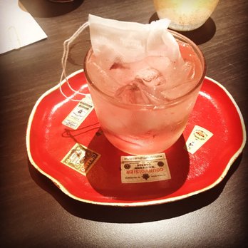 Indo - Rock sugar and hibiscus infused gin cocktail called plastic chair - Pan Asian Near Me - St. Louis, Missouri