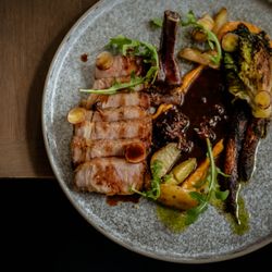The Courtney Room - ROASTED BONE IN PRIMROSE FARMS PORK CHOP *
⁠
/carrot, new potato, braised baby gem lettuce, fiddlehead, pine mostarda/⁠
