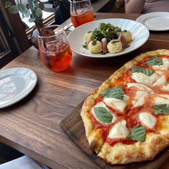 Piatti - Wood-Fried Margherita Pizza, ricotta dumplings, Piatta spritz - Italian Near Me - Seattle, Washington Piatti - Wood-Fried Margherita Pizza, ricotta dumplings, Piatta spritz - Italian Near Me - Seattle, Washington