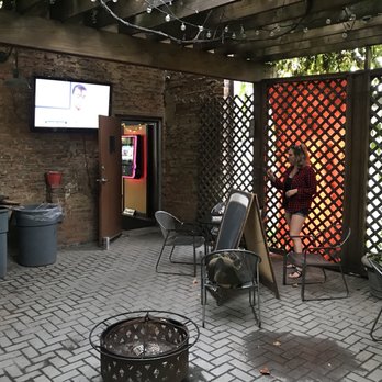 McNamara's - a patio with chairs and a television - Dive Bars Near Me - Cleveland, Ohio McNamara's - a patio with chairs and a television - Dive Bars Near Me - Cleveland, Ohio
