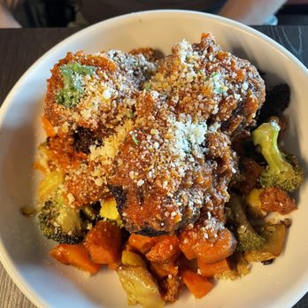 The Blackstone Meatball - Mushroom and white bean balls with roasted veg and bologna's sauce - Italian Near Me - Omaha, Nebraska The Blackstone Meatball - Mushroom and white bean balls with roasted veg and bologna's sauce - Italian Near Me - Omaha, Nebraska