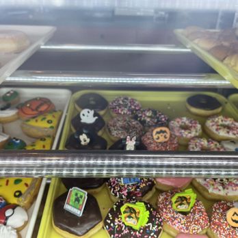 J Donuts - a variety of doughnuts in a display case - Donuts Near Me - Watauga, Texas