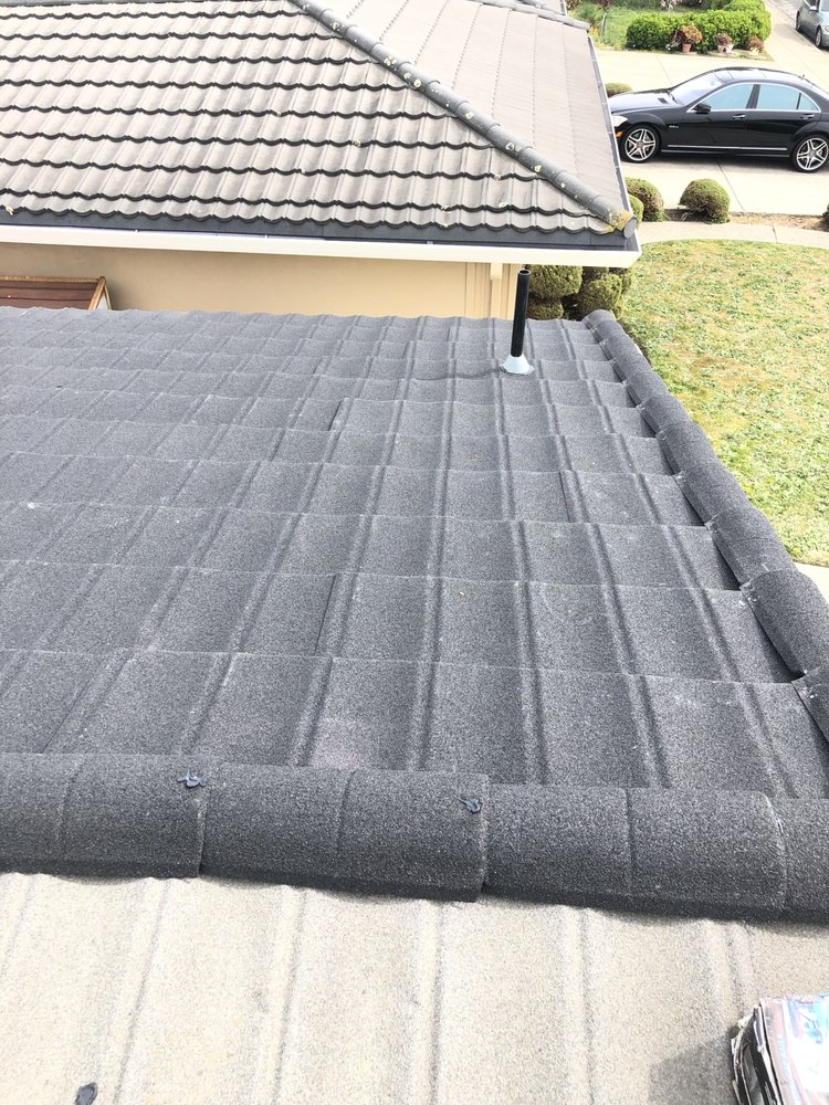 Slide of Nick’s Roofing