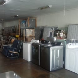 Gurnsey's Hardware & Furniture - Gurnsey's Hardware & Furniture - furniture and appliances on the right side of store.