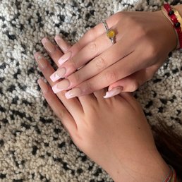 Acrylic nails done by Tuong. Nude base with pink tips and a small heart great work Acrylic nails done by Tuong. Nude base with pink tips and a small heart great work