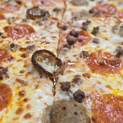 The Krusty Pirate. - Meat Lovers Pizza, half drizzles with Hot Honey