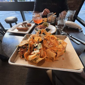 Henry's Tavern - Trash can nachos - New American Near Me - Denver, Colorado Henry's Tavern - Trash can nachos - New American Near Me - Denver, Colorado