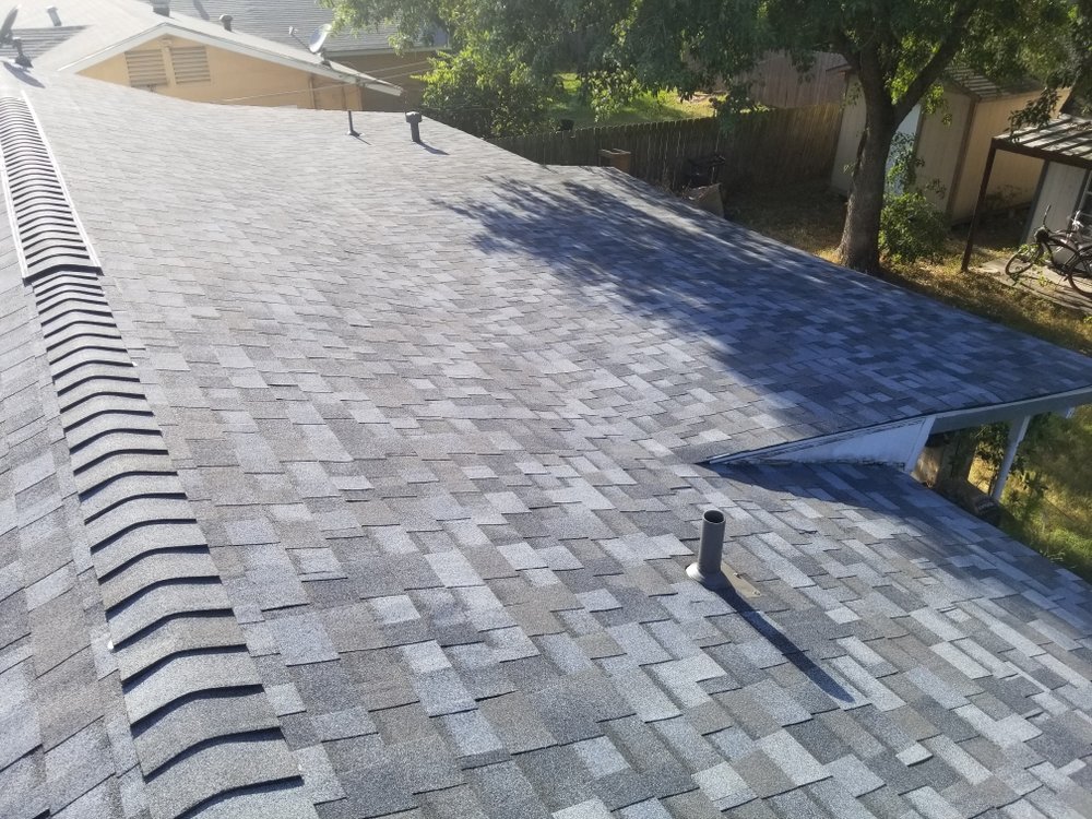 Slide of Monumental Roofing Services