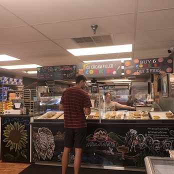 The Cookie Shop - a man standing in front of a counter - Desserts Near Me - Rapid City, South Dakota The Cookie Shop - a man standing in front of a counter - Desserts Near Me - Rapid City, South Dakota