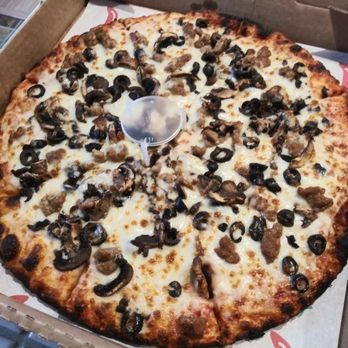 Oakley Tavern - 12" sausage, black olives and mushroom on thin crust - Kebab Near Me - Oakley, California Oakley Tavern - 12" sausage, black olives and mushroom on thin crust - Kebab Near Me - Oakley, California
