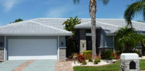 Slide of Suncoast Roofing Solutions