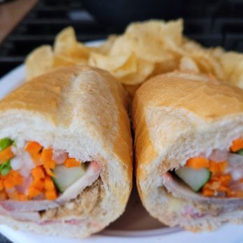 Bella Banh Mi Cafe - Lunch take-out fr@Bella Banh Mi Cafe 10/5/2022.Our Usual Banh Mi Saigon Special Sandwich 4 da both of us today.Ty David! Chips not included! - Sandwiches Near Me - Honolulu, Hawaii