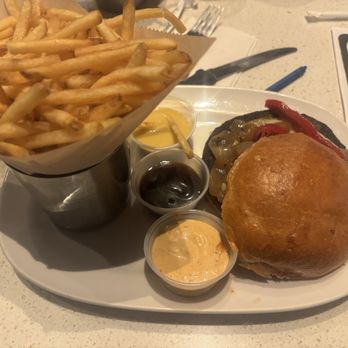 The Counter - Vegan patty with sauce flight and large portion of shoestring fries - Burgers Near Me - Honolulu, Hawaii