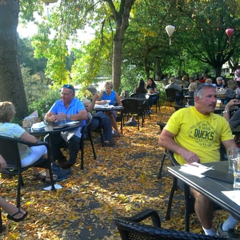 McMenamins North Bank - Outside seating area on a warm October afternoon. - Pubs Near Me - Eugene, Oregon