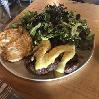 Lovely Day Cafe - Steak and eggs. Steak is covered and hollandaise sauce. Salad on the side. - Breakfast & Brunch Near Me - Bedford, Texas Lovely Day Cafe - Steak and eggs. Steak is covered and hollandaise sauce. Salad on the side. - Breakfast & Brunch Near Me - Bedford, Texas