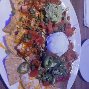 Yard House - Chicken nachos - New American Near Me - Bakersfield, California Yard House - Chicken nachos - New American Near Me - Bakersfield, California