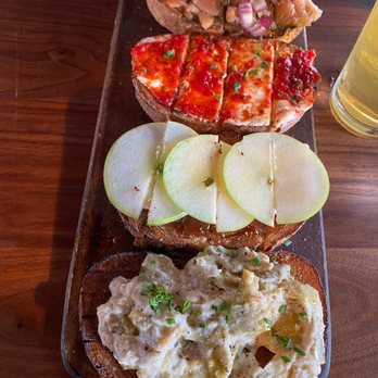 Postino Buckhead - from top to bottom: smoked salmon pesto, pepper jam and goat cheese, brie apple fig spread, warm artichoke spread - Wine Bars Near Me - Atlanta, Georgia