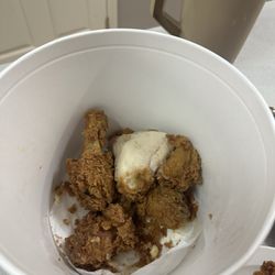 Chicken that sat in the bucket so long that the skin is sliding off.