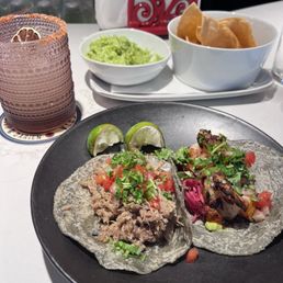 Guacamole, carnitas taco, shrimp taco, and the house marg Guacamole, carnitas taco, shrimp taco, and the house marg