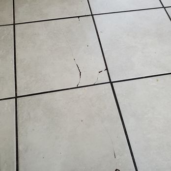 Affordable Used Appliances - The cracked tiles where this company dropped the fridge. - Appliances & Repair Near Me - Denver, Colorado Affordable Used Appliances - The cracked tiles where this company dropped the fridge. - Appliances & Repair Near Me - Denver, Colorado