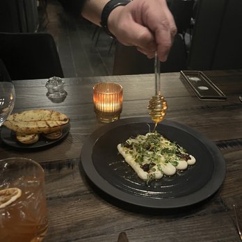 The Saint - Ricotta with local honey - Steakhouses Near Me - Dallas, Texas The Saint - Ricotta with local honey - Steakhouses Near Me - Dallas, Texas