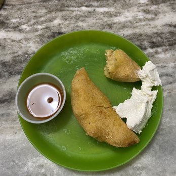 El Sombrero - Chicken empanadas, I added sour cream at home. - Bakeries Near Me - Gastonia, North Carolina