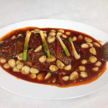 A-jiao - Whole fish with thousands garlic, it is medium spicy for me but my friend said it's too hot for him. - Chinese Near Me - New York, New York A-jiao - Whole fish with thousands garlic, it is medium spicy for me but my friend said it's too hot for him. - Chinese Near Me - New York, New York