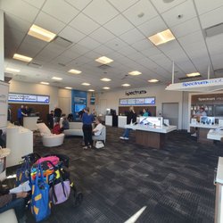 Spectrum - long lines, upset people, not enough seating, too few employees
