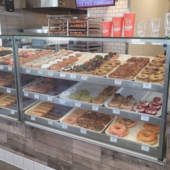Randy's Donuts - A display case of colorful Texas size donuts.. - Donuts Near Me - Costa Mesa, California Randy's Donuts - A display case of colorful Texas size donuts.. - Donuts Near Me - Costa Mesa, California