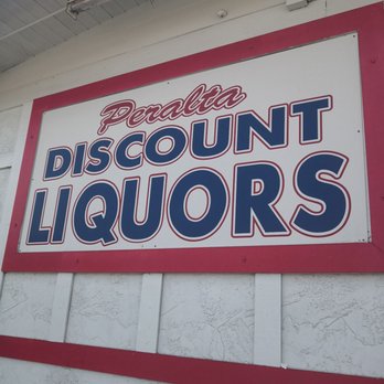 Peralta Discount Liquors - a sign on a building - Beer, Wine & Spirits Near Me - Fremont, California Peralta Discount Liquors - a sign on a building - Beer, Wine & Spirits Near Me - Fremont, California
