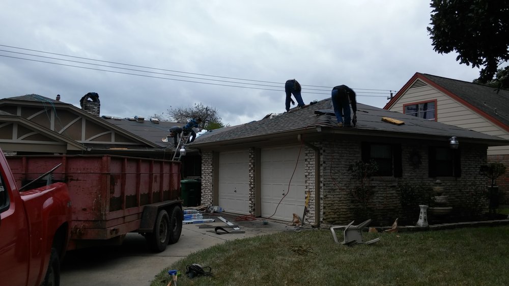 Slide of Stades Roofing