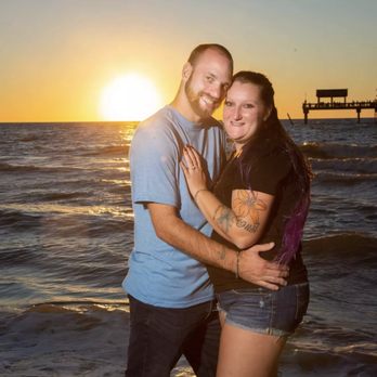 TK Beachside Services - a man and a woman hugging on the beach - Landscaping Near Me TK Beachside Services - a man and a woman hugging on the beach - Landscaping Near Me