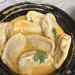 MoMoMandu - Soup dumplings sauce is very mild in spice