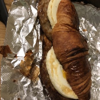 Barking Dog Roasters - Meat croissant - pork sausage (2), cheddar, 2 eggs and a croissant- comes with hot sauce on the size yum! - Coffee Roasteries Near Me - Sonoma, California