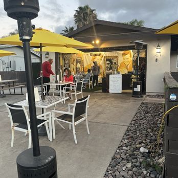 Burger Kook - Outside dining driveway looking up towards ordering area and indoor dining - Burgers Near Me - Bonita, California Burger Kook - Outside dining driveway looking up towards ordering area and indoor dining - Burgers Near Me - Bonita, California