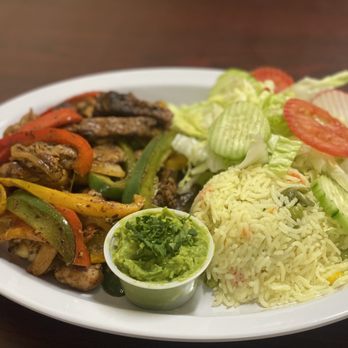 Zion Salvadorean - a plate of food on a table - Honduran Near Me - Bossier City, Louisiana Zion Salvadorean - a plate of food on a table - Honduran Near Me - Bossier City, Louisiana