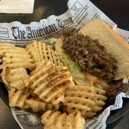 a plate of fries and a sandwich