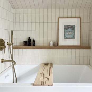 Garcia Tile - a bathtub with a wooden shelf above it - General Contractors Near Me - Santa Clara, California Garcia Tile - a bathtub with a wooden shelf above it - General Contractors Near Me - Santa Clara, California