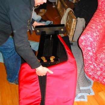 Alden's Piano - Putting the pedals into a special bag for transport. - Piano Services Near Me - Waukegan, Illinois Alden's Piano - Putting the pedals into a special bag for transport. - Piano Services Near Me - Waukegan, Illinois