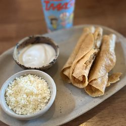 Amor A Mi - Kids 3 taquitos de papa plate with crema and queso fresco